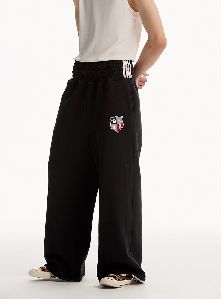 EAC–TwinBelt Crest Baggy Sweatpants