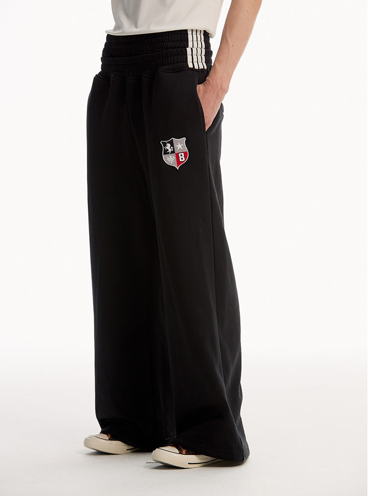 EAC–TwinBelt Crest Baggy Sweatpants