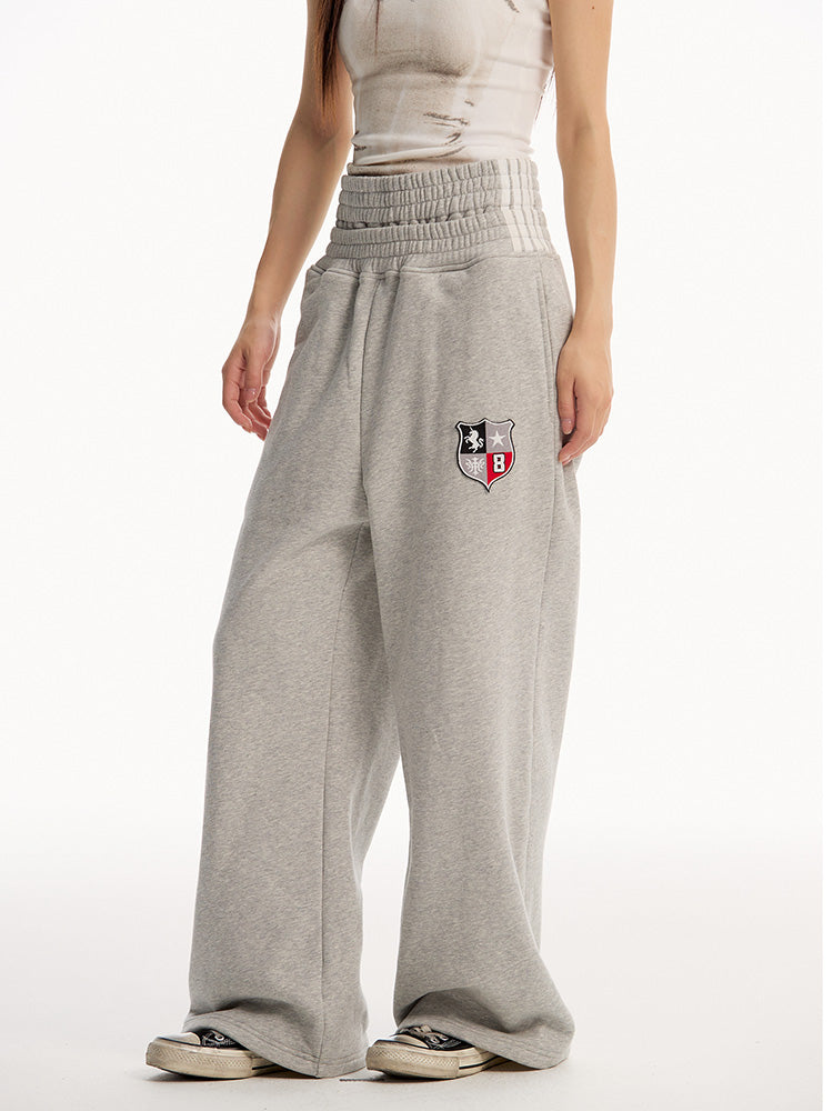 EAC–TwinBelt Crest Baggy Sweatpants