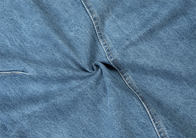 EAC–Distressed Curved Jeans