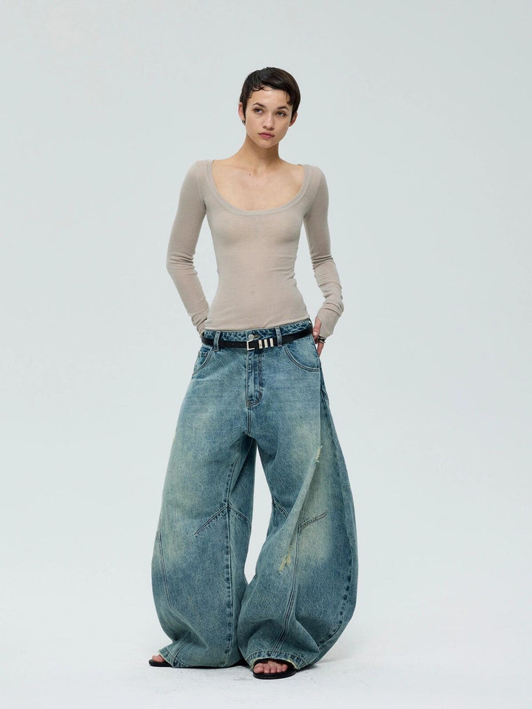 EAC–Distressed Curved Jeans