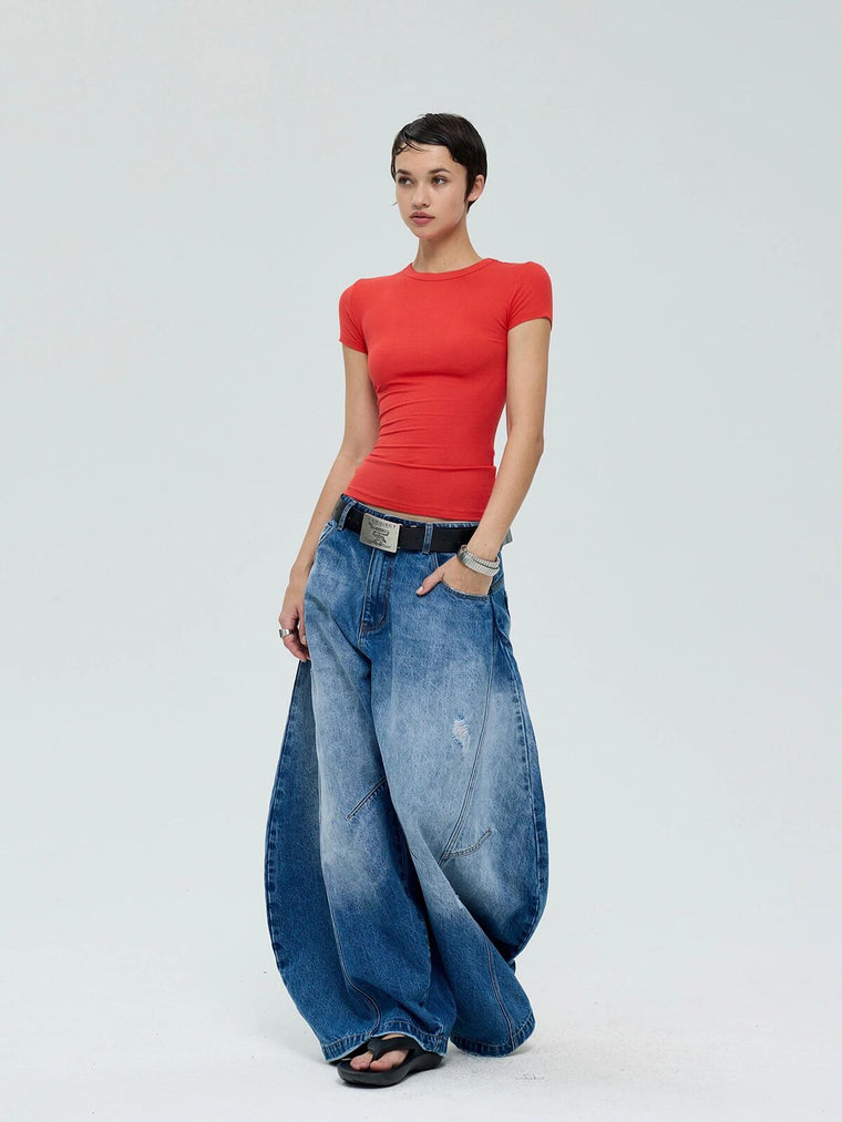 EAC–Distressed Curved Jeans