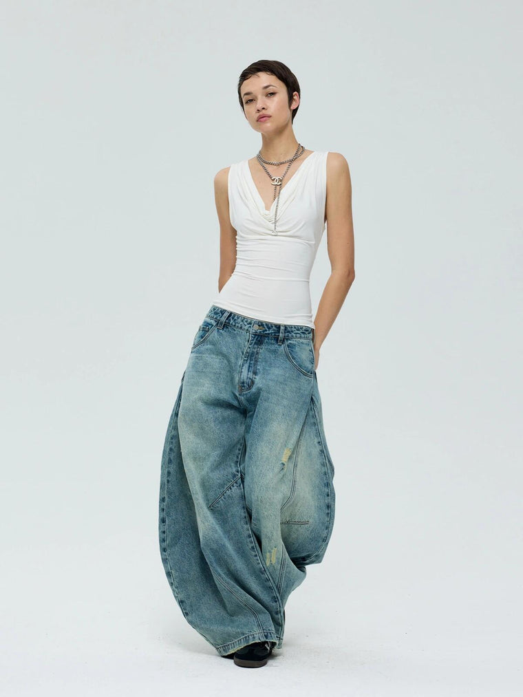 EAC–Distressed Curved Jeans
