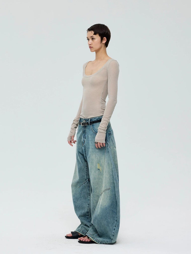 EAC–Distressed Curved Jeans