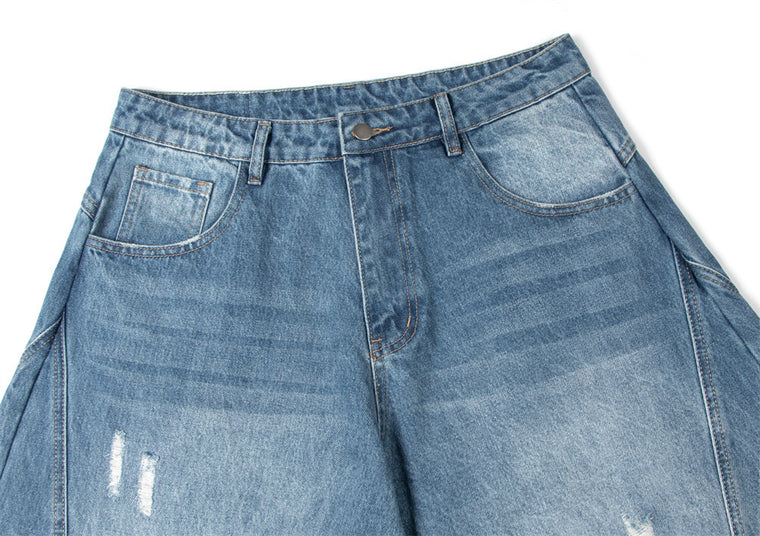EAC–Distressed Curved Jeans