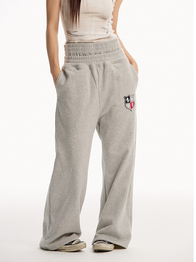 EAC–TwinBelt Crest Baggy Sweatpants
