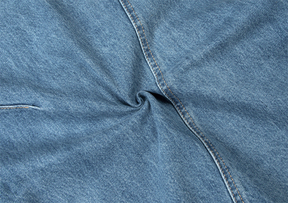 EAC–Distressed Curved Jeans