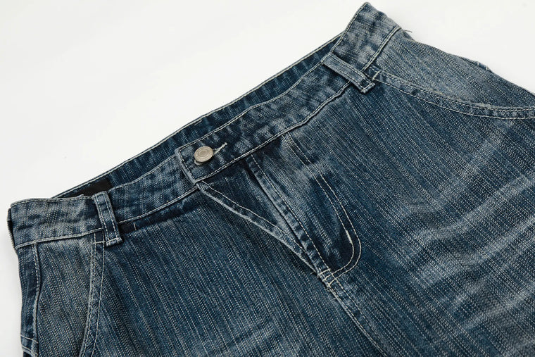 EAC–Asymmetric Front Curved Denim Jeans